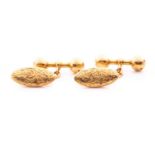 A pair of late Victorian 18ct yellow gold cufflinks, with hollow lozenge and bar segments,