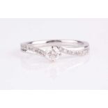 An 18ct white gold and diamond engagement ring, set with a solitaire diamond of approximately 0.20