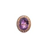 An 18ct yellow gold, diamond, and amethyst cocktail ring, set with a large mixed oval-cut
