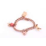 A 9ct rose gold curb-lik charm bracelet, with heart-shaped locket clasp, suspended with a yellow