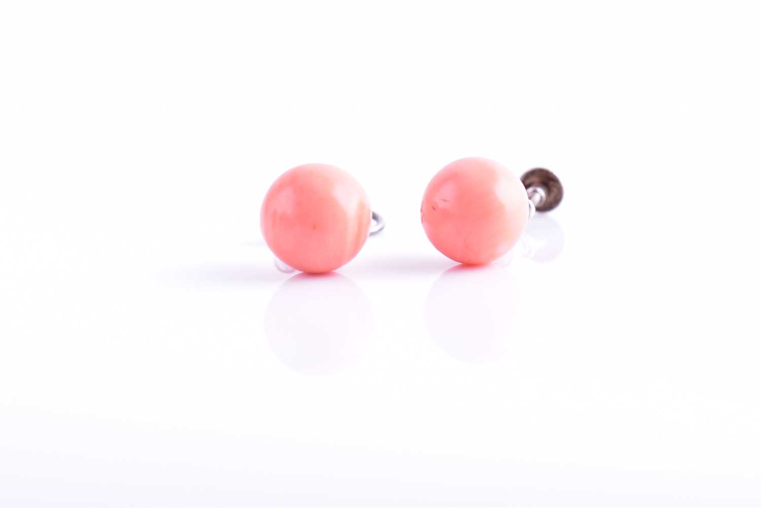 A pair of diamond and coral drop earrings, each suspended with a rounded coral bead, approximately - Image 2 of 2