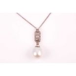 A diamond and pearl pendant, the rectangular plaque mount inset with round-cut diamonds, and