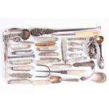 A group lot of silver and white metal items, including a silver cylindrical thermometer case,