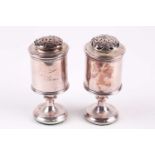 A pair of Regency silver cylindrical castors, London 1813 (maker indistinct), on a circular