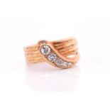 An 18ct yellow gold and diamond snake ring, the head set with five graduated old-cut diamonds, the
