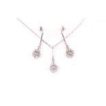 An 18ct white gold and diamond drop pendant necklace, set with round-cut diamonds, pendant 3.2 cm