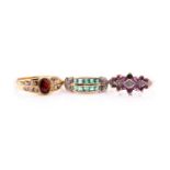 A 9 carat gold ruby and diamond triple cluster ring, (two rubies deficient) an emerald and diamond