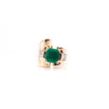 A 14ct yellow gold, diamond, and emerald ring, set with a mixed square-cut emerald, measuring