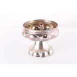 An early 20th century Arts and Crafts Tudor style silver footed bowl. Chester 1906 by Nathan &