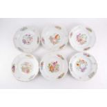 A set of six 19th century Meissen cabinet plates, each with floral decoration on an ivory ground,