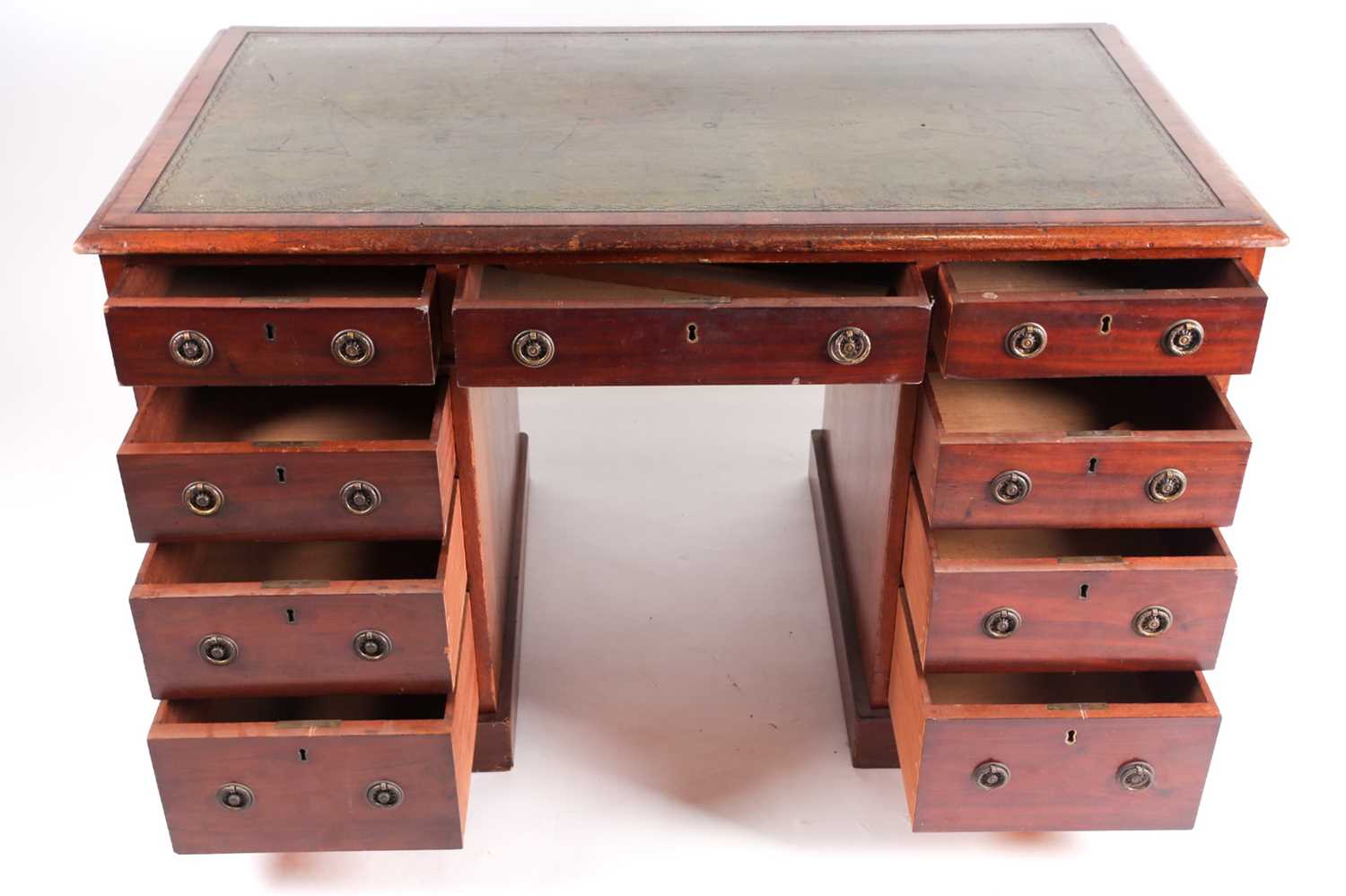 An Edwardian mahogany kneehole writing desk. With tooled leather inset top above six pedestals and - Image 2 of 3