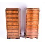 A pair of Louis XV style Kingwood serpentine escritoire semainiers. With white marble caddy tops,