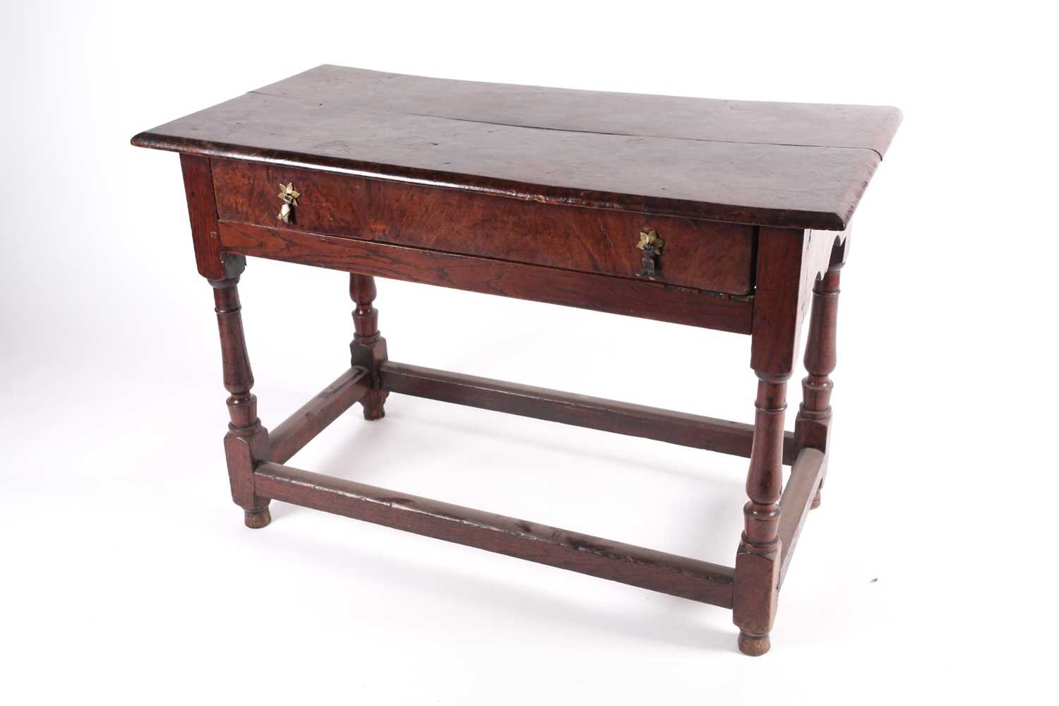 An unusual late 17th-century burr elm and oak single drawer rectangular side table, the top and