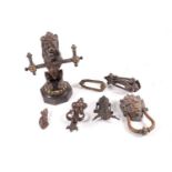 A collection of 19th-century metalware door knockers, to include a large lion-mask example, and a