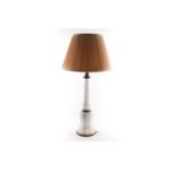 A large opaline glass table lamp, of shaped form with brass mounts, 54 cm high (to top of