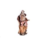 A 16th century late Baroque, probably Southern German or Spanish, limewood figure of a saint,
