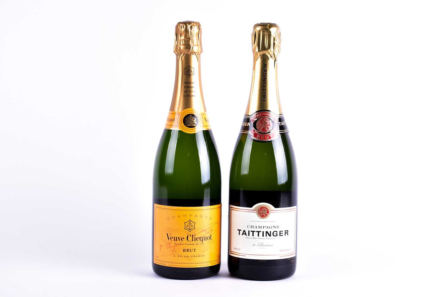 Two boxed bottles of Champagne: Veuve Clicquot Ponsardin and Taittinger, each 70 cl.Qty: 2