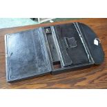 A Victorian Morocco leather travelling despatch writing case, monogrammed with Earls Coronet and