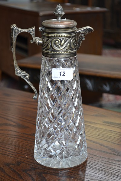 A Victorian cut glass claret jug, with plated mounts