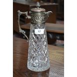 A Victorian cut glass claret jug, with plated mounts