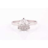 A single stone diamond ring, set with a rounded trillion-cut diamond, approximately 2.20 carats,