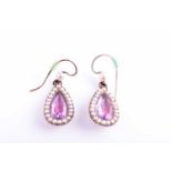 A pair of Victorian pearl and amethyst drop earrings, each with a closed-back set pear-cut
