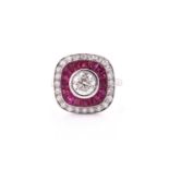 An 18ct white gold, diamond, and ruby target ring, in the Art Deco style, centred with a round-cut