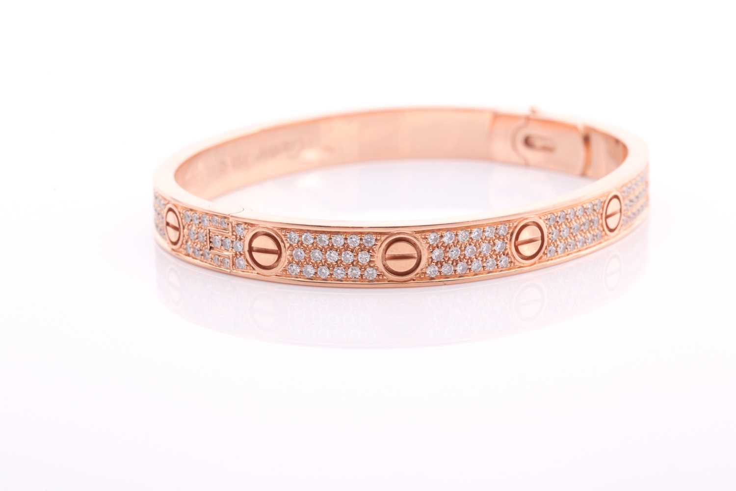 Cartier. A diamond set Love bangle; in 18 carat rose gold; set with 204 round brilliant cut - Bild 5 aus 7