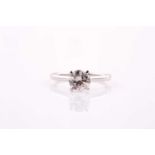 A platinum and diamond ring, the solitaire round brilliant-cut diamond of approximately 1.12 carats,