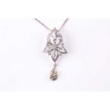 An openwork diamond drop pendant, set with round brilliant-cut diamonds, the lower pear-shaped