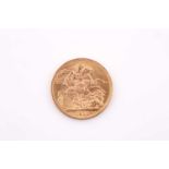 A George V full sovereign, dated 1912.Condition report: Some wear to the milled edge visable under a
