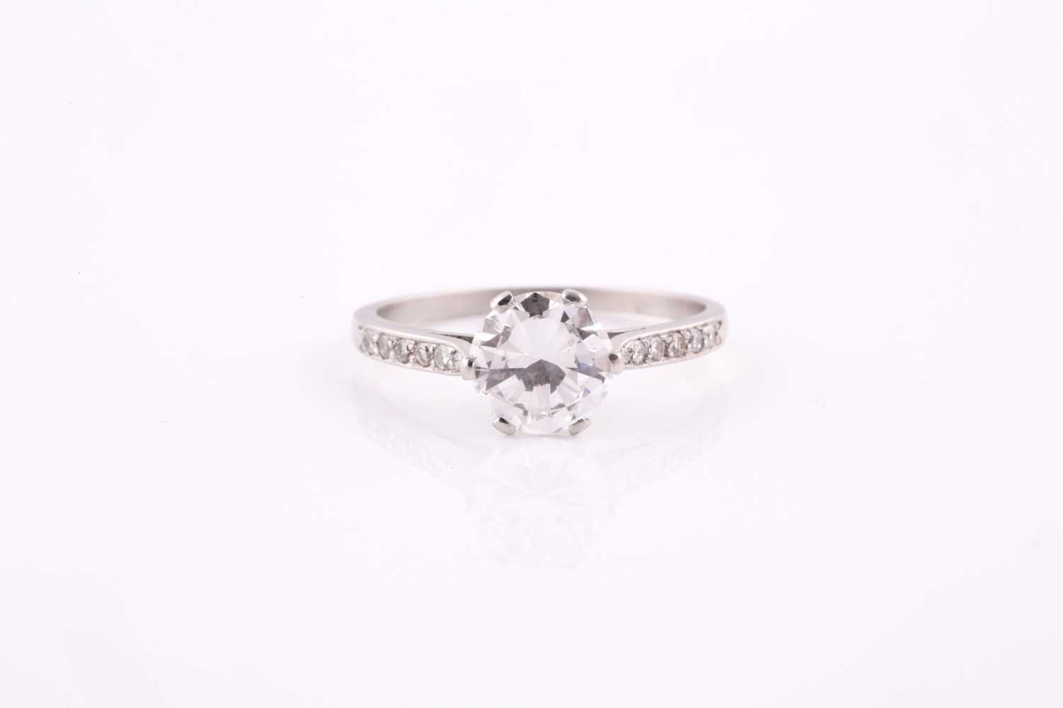 A solitaire diamond ring, set with a round brilliant-cut diamond of approximately 1.14 carats,