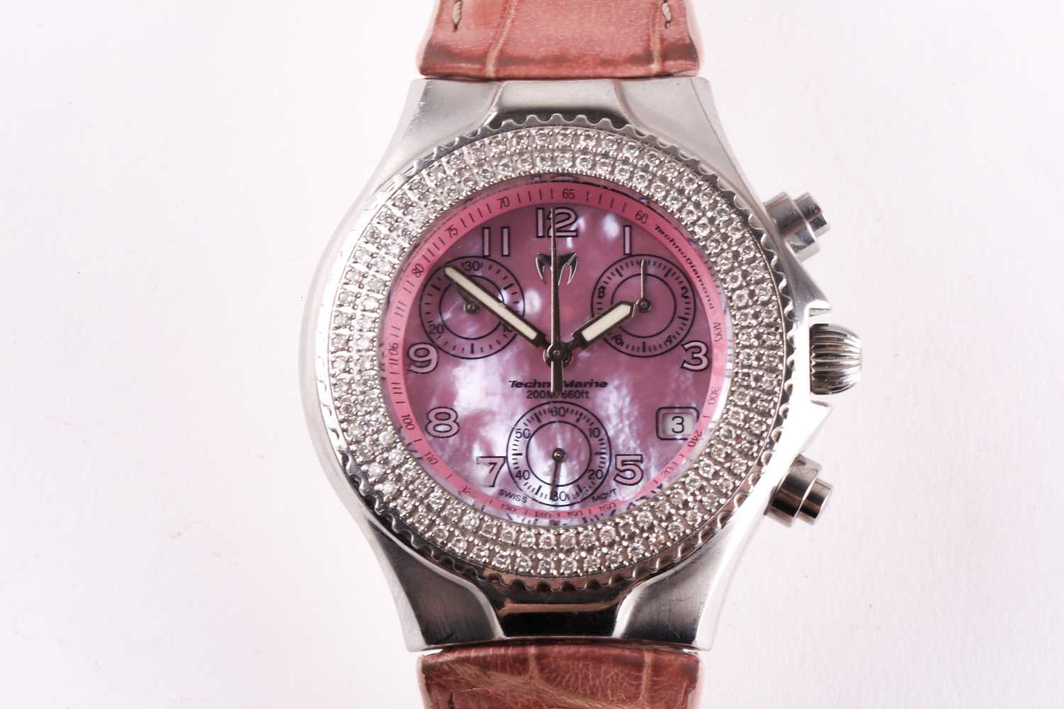 A Technomarine ladies wristwatch, with pink pearlescent dial and "Tecno Diamond" bezal, on a pink - Image 4 of 4