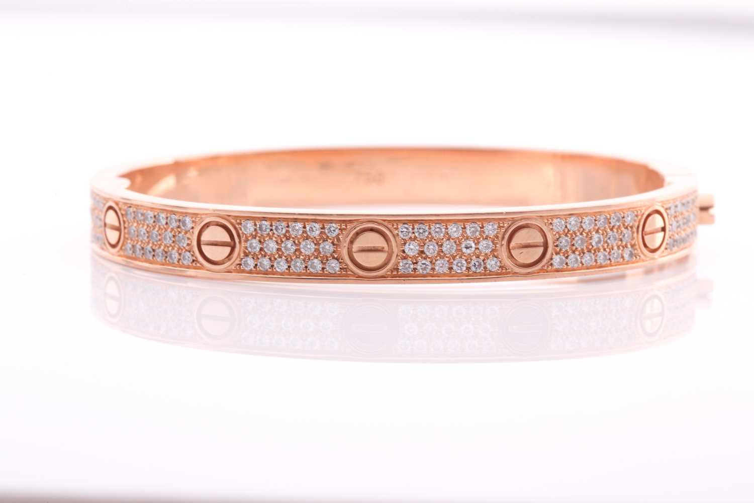 Cartier. A diamond set Love bangle; in 18 carat rose gold; set with 204 round brilliant cut - Bild 6 aus 7