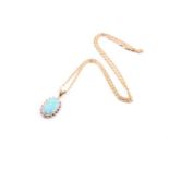 An 18ct yellow gold, opal and diamond pendant, within a surround of sixteen collet set round