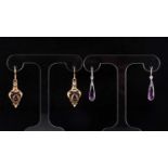 A pair of 18ct white gold, diamond, and amethyst drop earrings, with briolette-cut amethyst drops