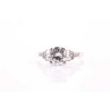 A solitaire diamond ring, set with a round brilliant-cut diamond of approximately 1.40 carats,