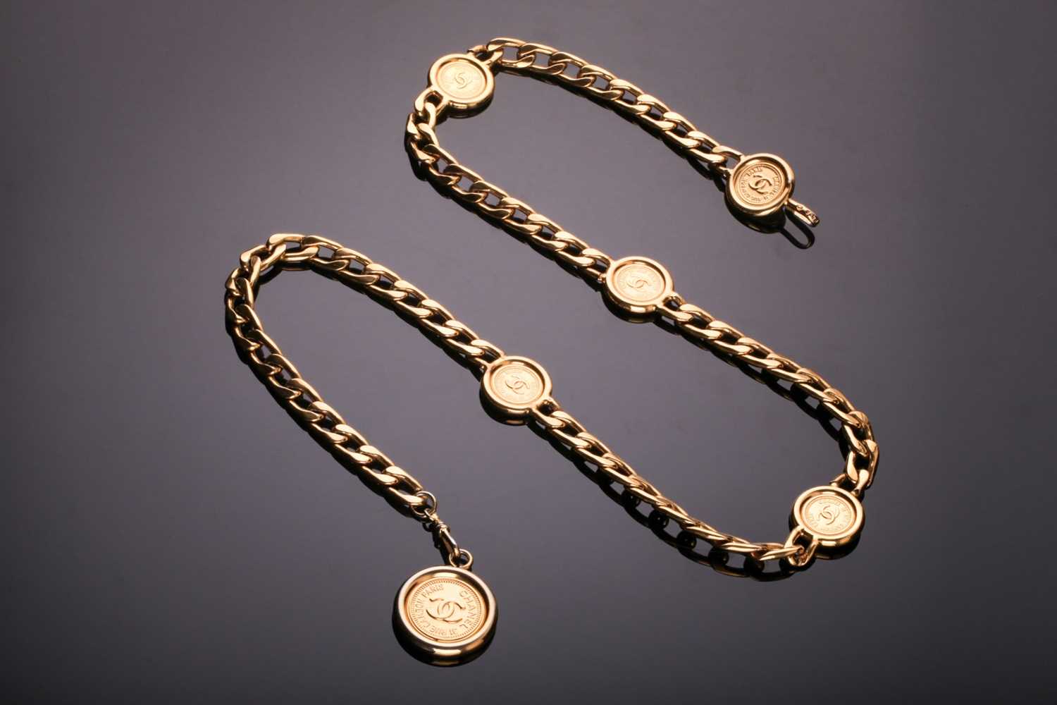 A Chanel "31 Rue Cambon Paris" belt, the gold plated curb link and "CC" medallion chain with