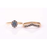 A diamond and blue topaz oval cluster ring in 9 carat gold mount, Size M1/2; together with a seven