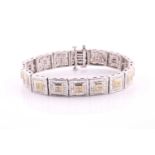 An 18ct white gold and diamond panel bracelet, the square panels inset with a square of four