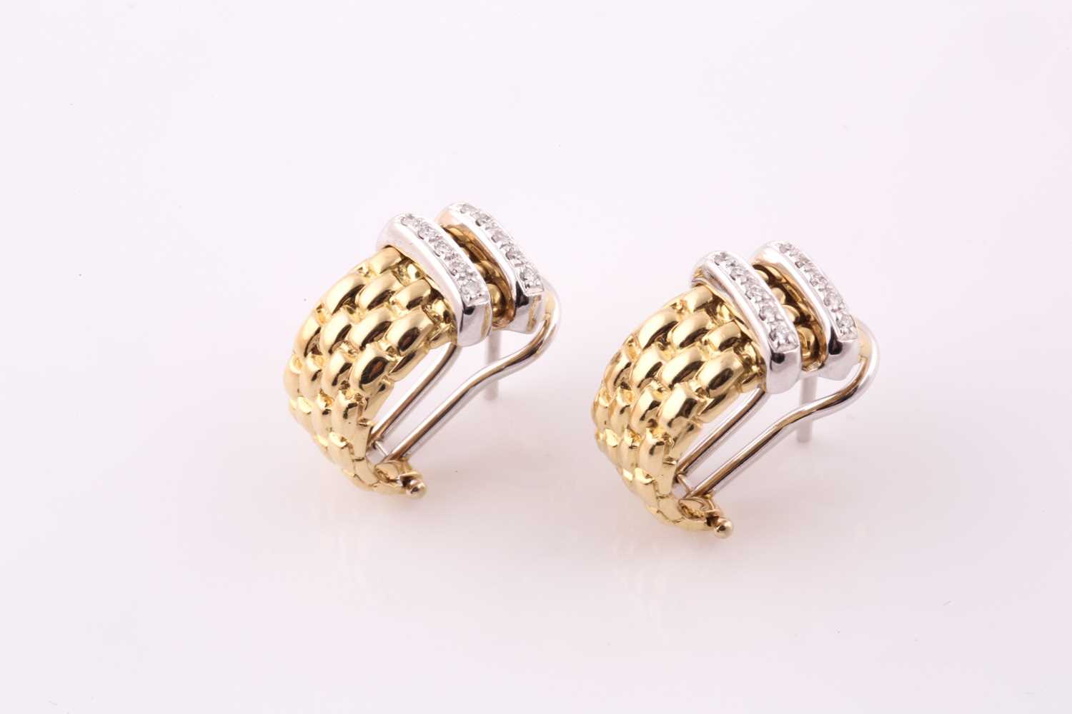 Fope, Italy. A pair of 18ct yellow gold hoop earrings, each with diamond set twin bars, weighing 0.