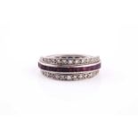 A diamond, sapphire, and ruby hinged eternity ring, the hoop set with calibre-cut rubies and