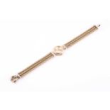 A 9ct yellow gold ladies Ca' D'oro watch, with rounded gilt baton dial, on triple rope-twist chain