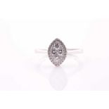 An 18ct white gold and diamond cluster ring, the marquise-shaped mount inset with round brilliant-