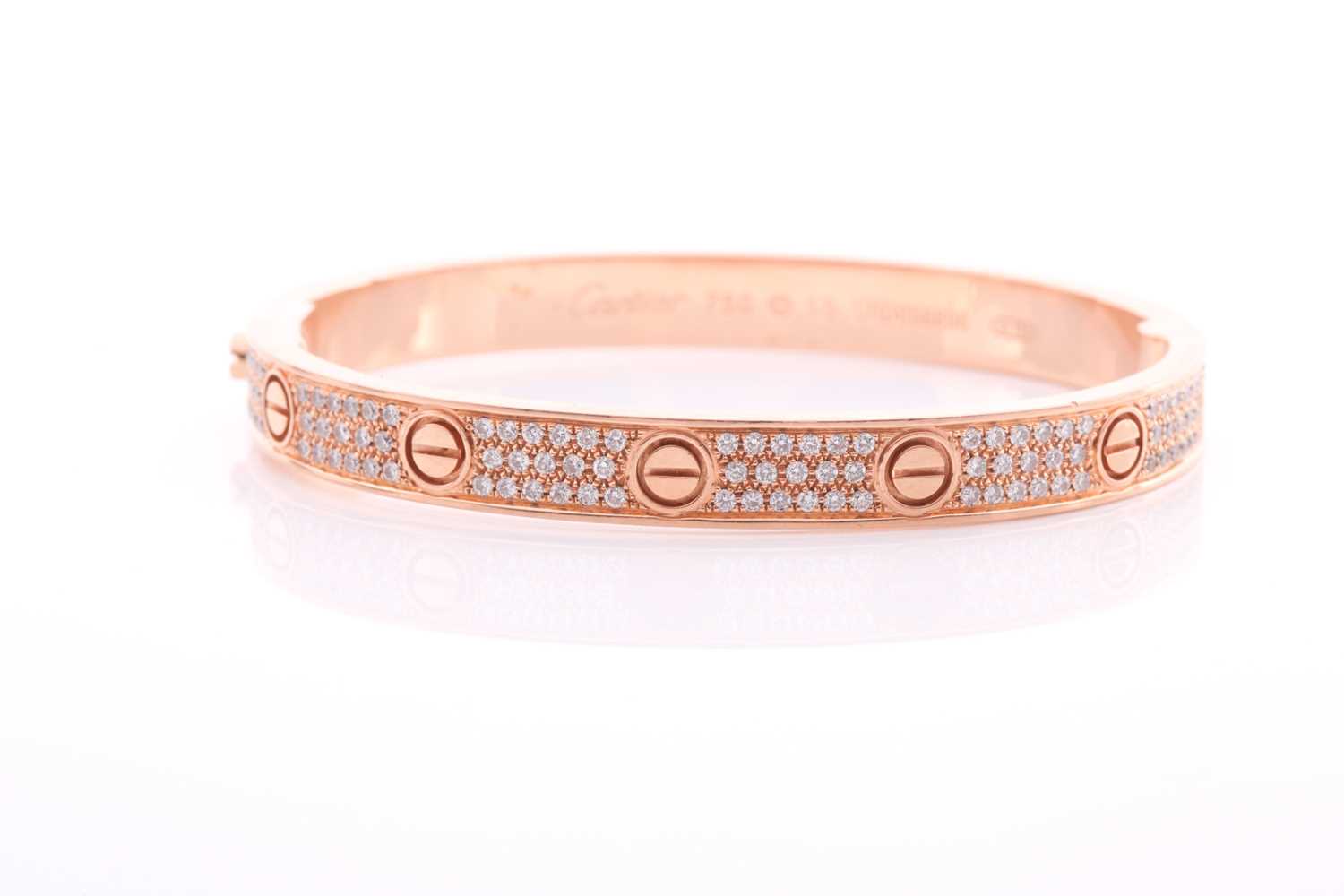 Cartier. A diamond set Love bangle; in 18 carat rose gold; set with 204 round brilliant cut - Bild 2 aus 7