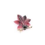 Carved rhodonite maple leaf brooch, the naturalistic yellow precious metal stalk set with round