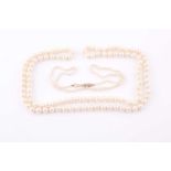 A graduated pearl necklace, the pearls ranging from 2.5 - 5.3 mm diameter, approximately 37 cm long,