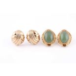 A pair of 18ct yellow gold and jade earrings, set with oval cabochon green jade, within a Greek