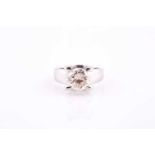 A solitaire diamond ring, set with a round brilliant-cut diamond of approximately 2.30 - 2.40