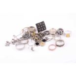 A group of various silver and white metal rings, together with a small quantity of chains, a